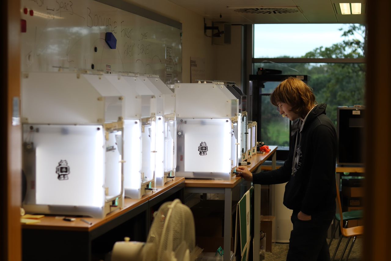 A Makerspace maker, using 3D printers